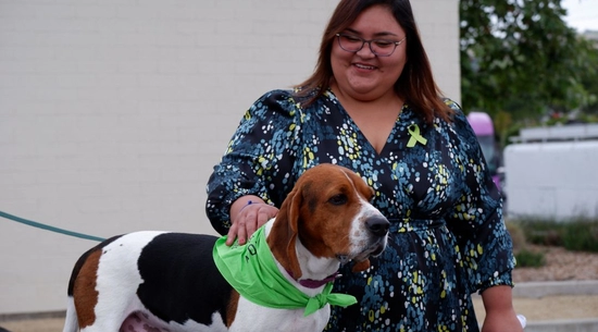 Eunisses Hernandez petting a dog