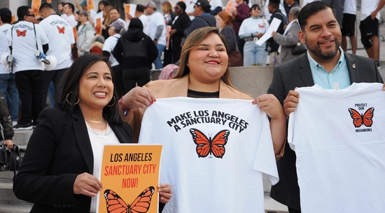 Councilmembers Hernandez, Jurado, and Soto-Martinez Holding "Makes LA A Sanctuary City" swag outside City Hall