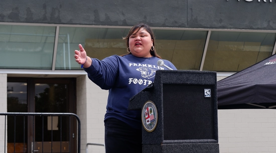 Councilmember Hernandez stands at a podium