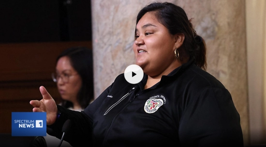Close up of Councilmember Hernandez speaking in a black jacket