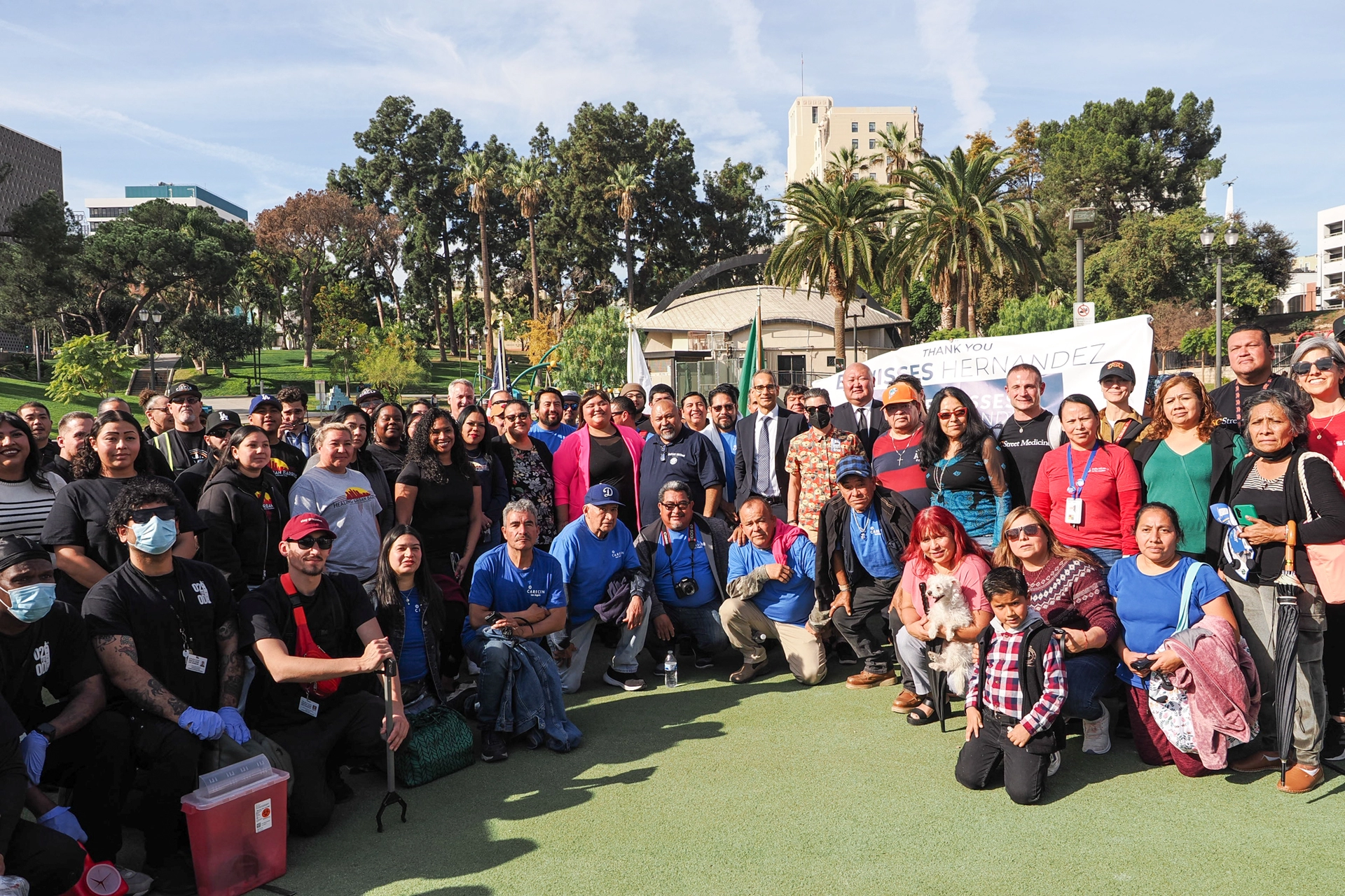 Eunisses Hernandez in a group photo with stakeholders at MacArthur Park.